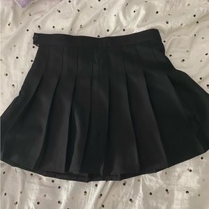 black pleated skirt